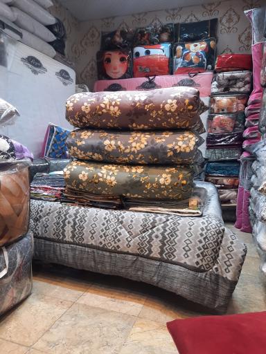 عکس لحافدوزی و بالش پنبه زنی