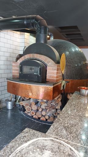 عکس پیتزا مانو