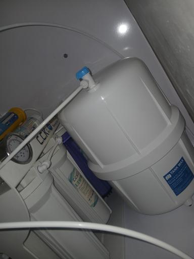 عکس تعمیرات دستگاه تصفیه آب خانگی مهرداد