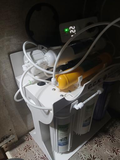 عکس تعمیرات دستگاه تصفیه آب خانگی مهرداد