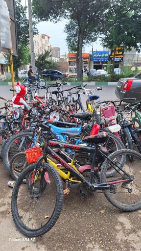 عکس تعمیر دوچرخه بهروز