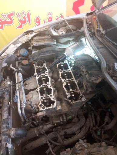 عکس مکانیک برق و انژکتور ایساکو سایپا یدک