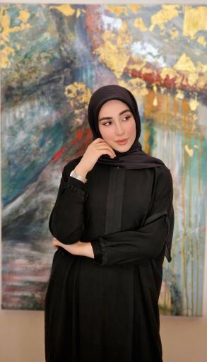 عکس فروشگاه لباس برند نورا