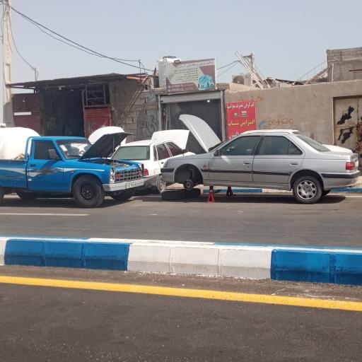 عکس تنظیم موتور و مکانیکی آرمان