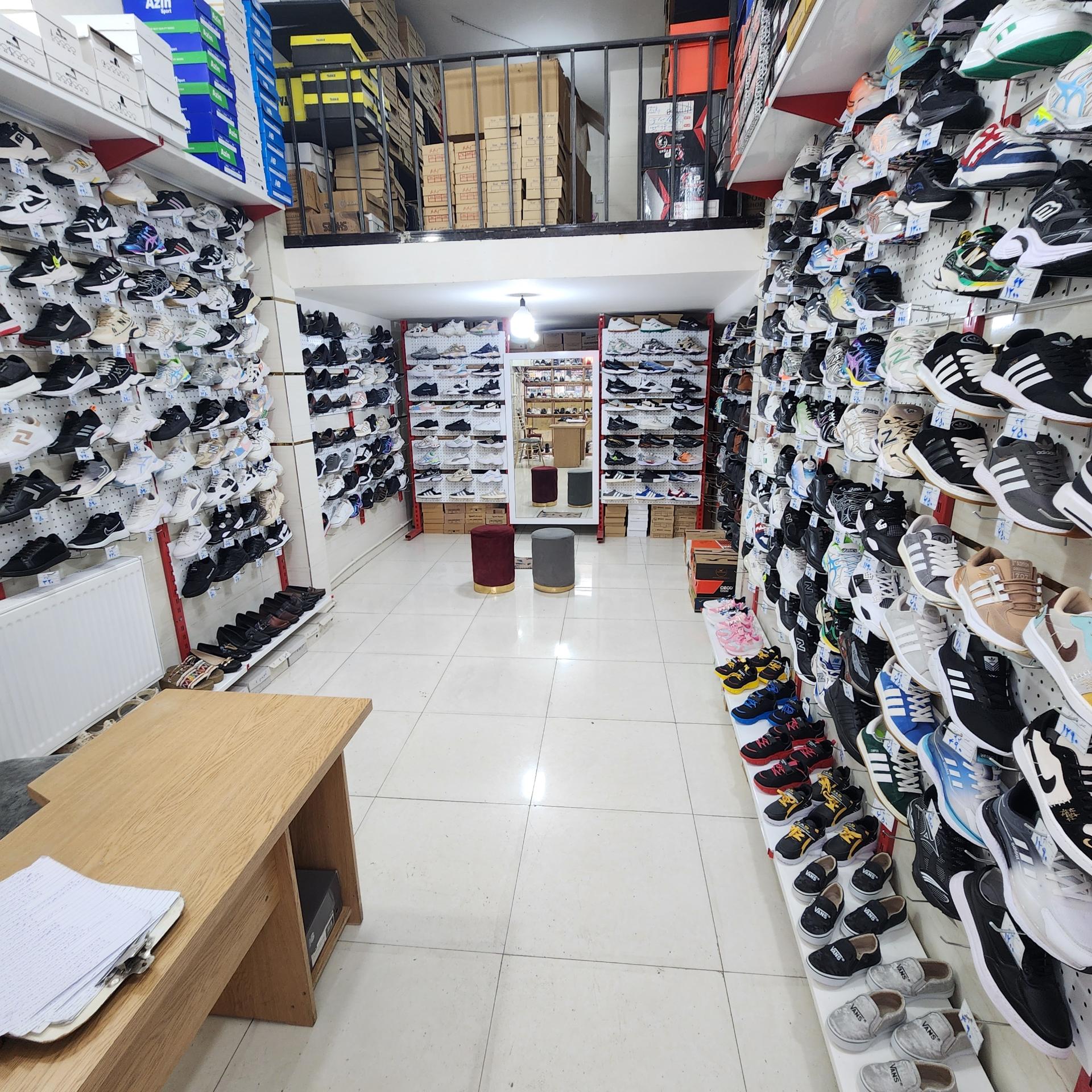 عکس فروشگاه کفش آیرا