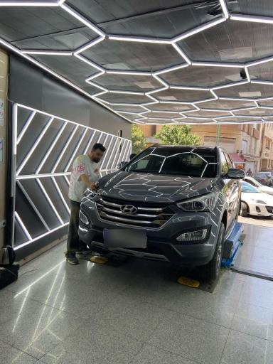 عکس کارشناسی و تشخیص رنگ و فنی خودرو