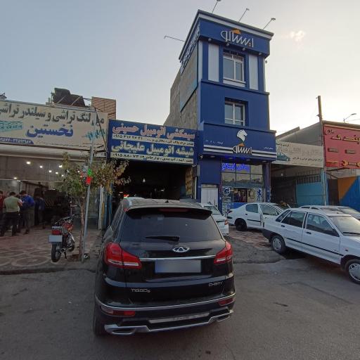 عکس شیشه اتومبیل علیجانی