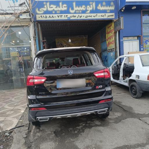 عکس شیشه اتومبیل علیجانی