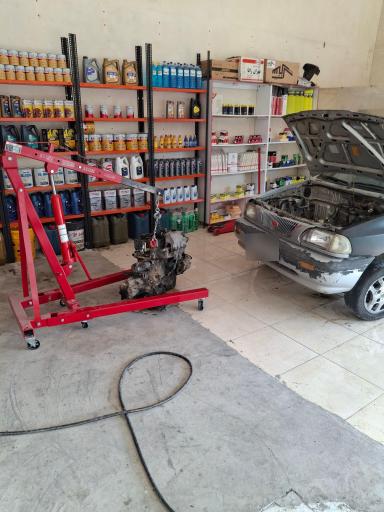 عکس مکانیکی و اتو سرویس میرزا