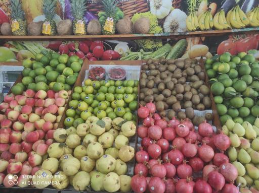 عکس میوه فروشی چهار فصل سیب سبز 