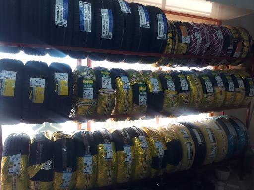 عکس لاستیک فروشی تاجی