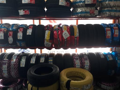 عکس لاستیک فروشی تاجی