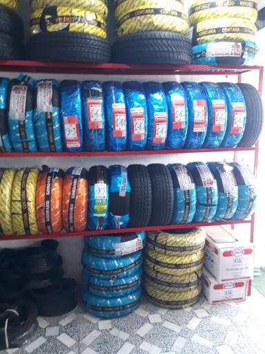 عکس لاستیک فروشی تاجی