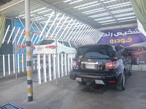 عکس تشخیص رنگ و تست فنی خودرو نخل جنوب