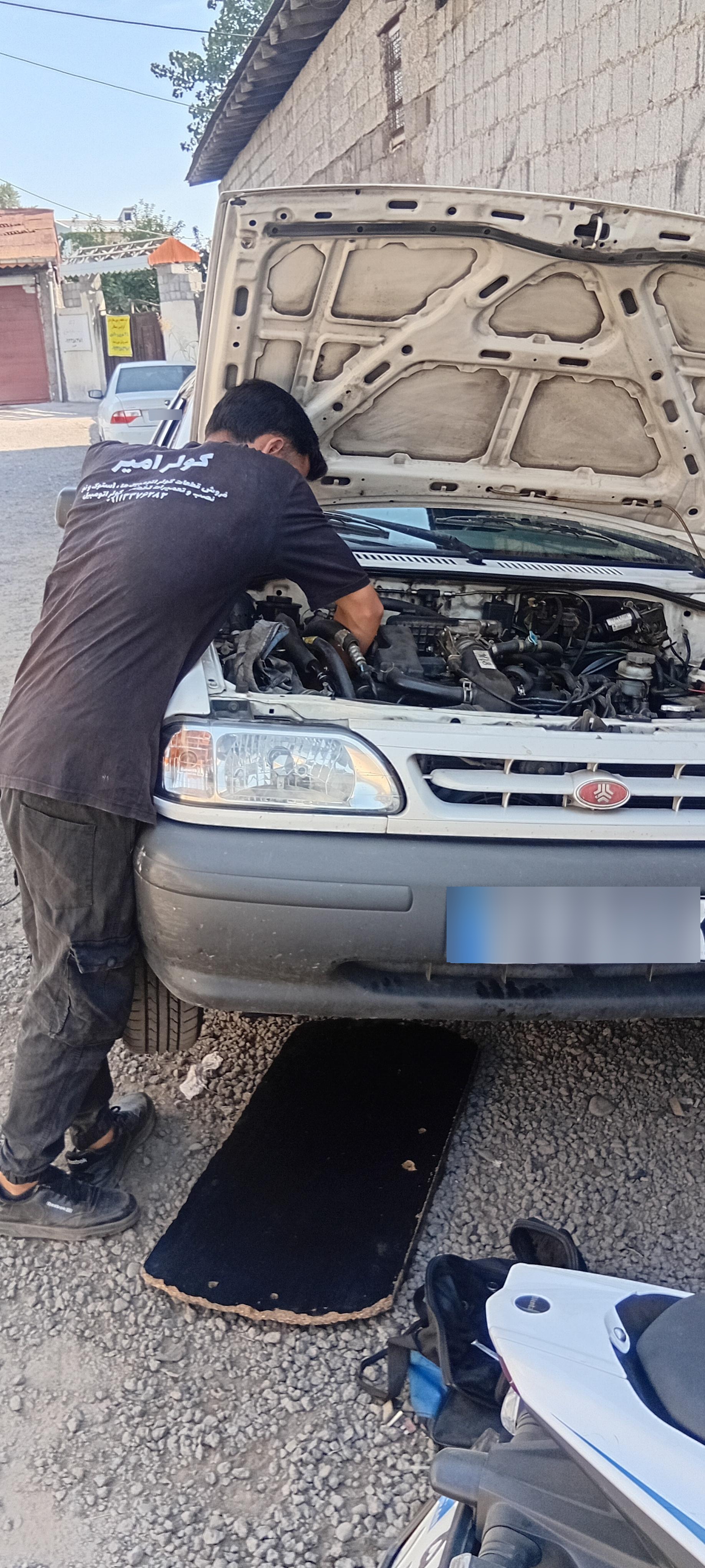 عکس باطری سازی برق اتومبیل مهران