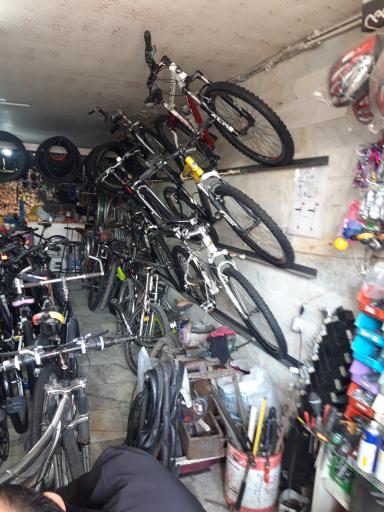 عکس فروشگاه و دوچرخه سازی فلاحی