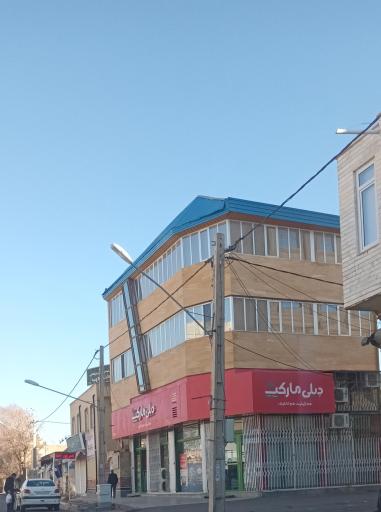 عکس دیلی مارکت  (شهید مطهری)