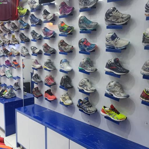 عکس فروشگاه اورجینال اسپرت قم