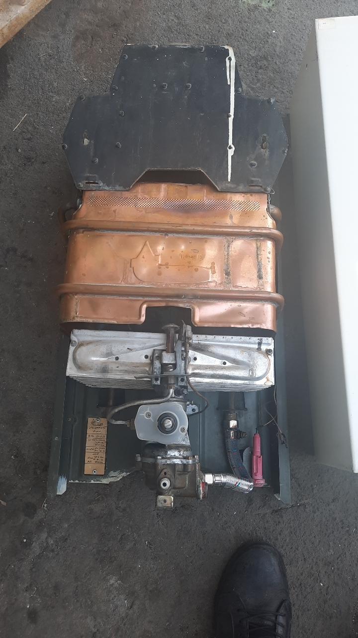 عکس تعمیرات لباسشویی و آبگرمکن فرزین