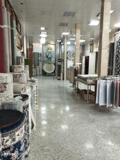 عکس فرش زمرد مشهد