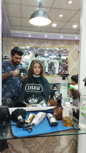 عکس آرایشگاه مردانه و کودک هرکات