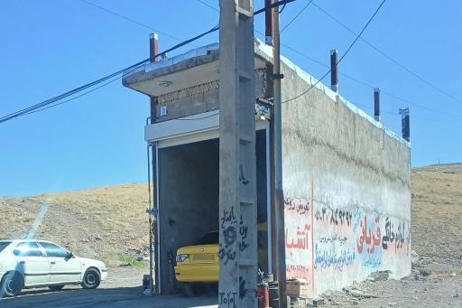 عکس اتوسرویس و تعویض روغن آتشبار