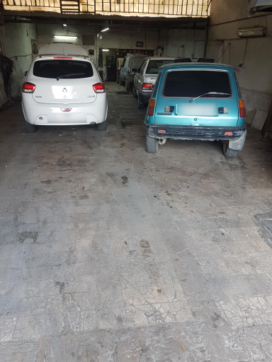 عکس تعمیرگاه رنو و پی کی انصاف
