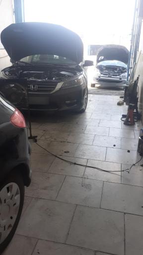 عکس تعمیرگاه مبتکر