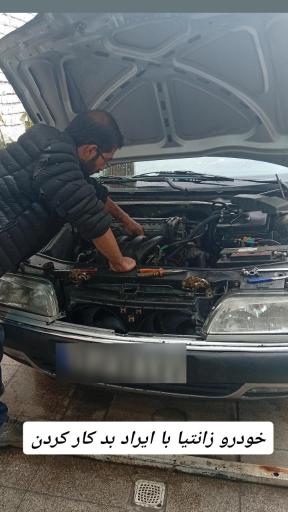 عکس تست انژکتور و باطری سازی نوین صنعت