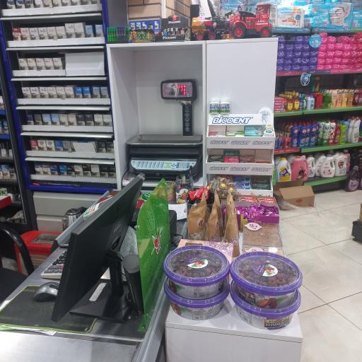 عکس فروشگاه مانلی