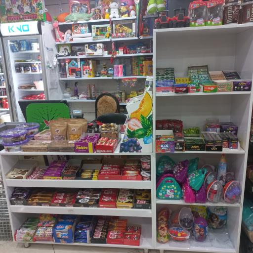 عکس فروشگاه مانلی