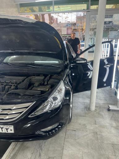 عکس کارشناسی بدنه و فنی خودرو گستر