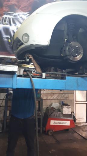 عکس جلوبندی سازی و کمک فنرسازی کریمی