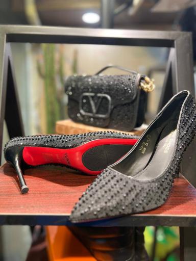 عکس فروشگاه کیف و کفش لوفر