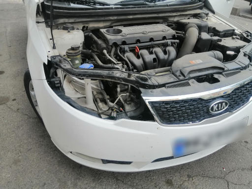 عکس تعمیرگاه تخصصی کیلومتر و چراغ خودروی مرکزی