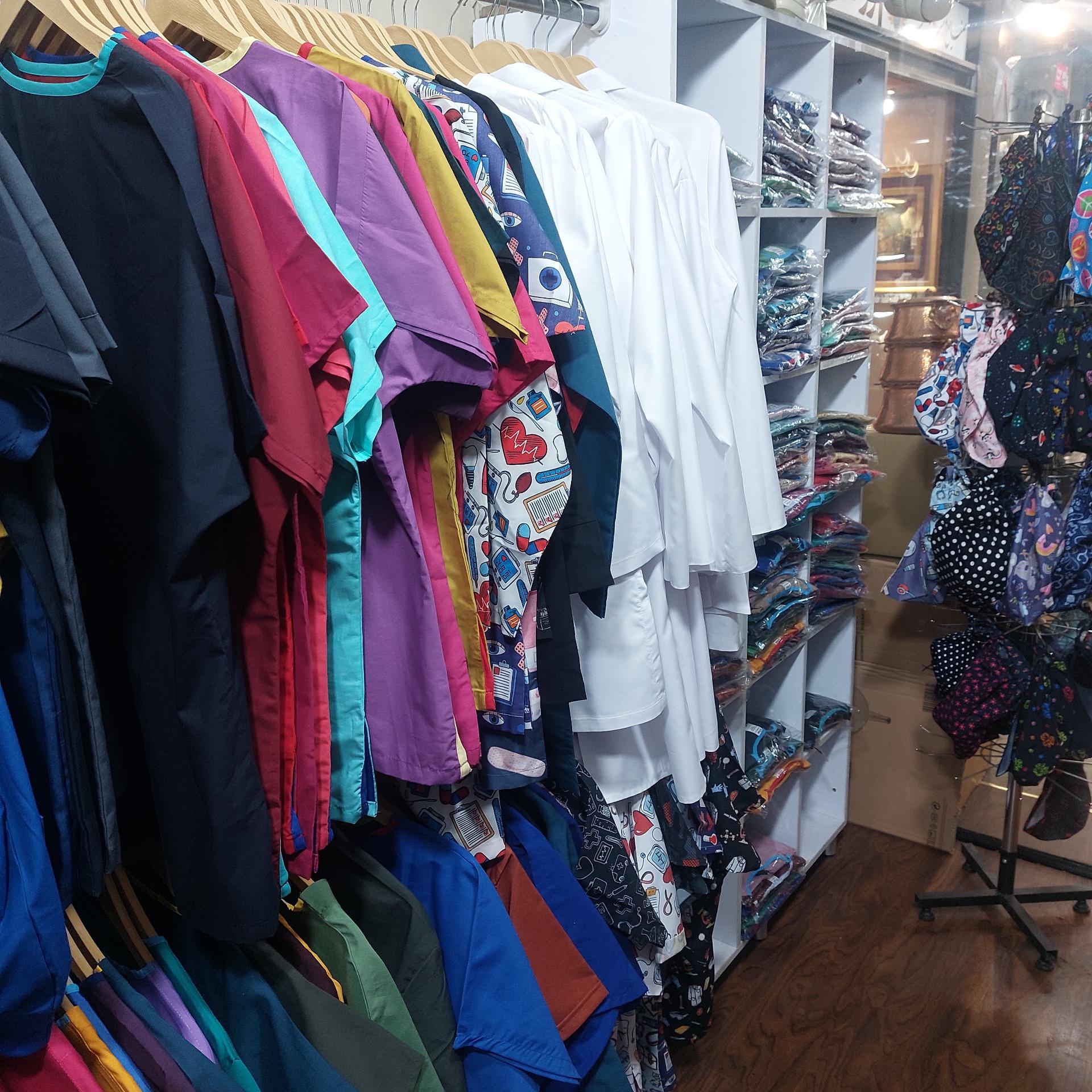 عکس فروشگاه روپوش ریوا