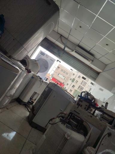 عکس تعمیرات لباسشویی ۱۱۰