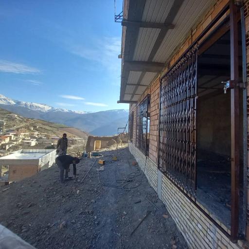 عکس شاخ گوزنی و درب آکاردئونی مهندس غلامی