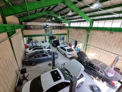 عکس تعمیرگاه بنز و پورشه و ولوو اعتدالی