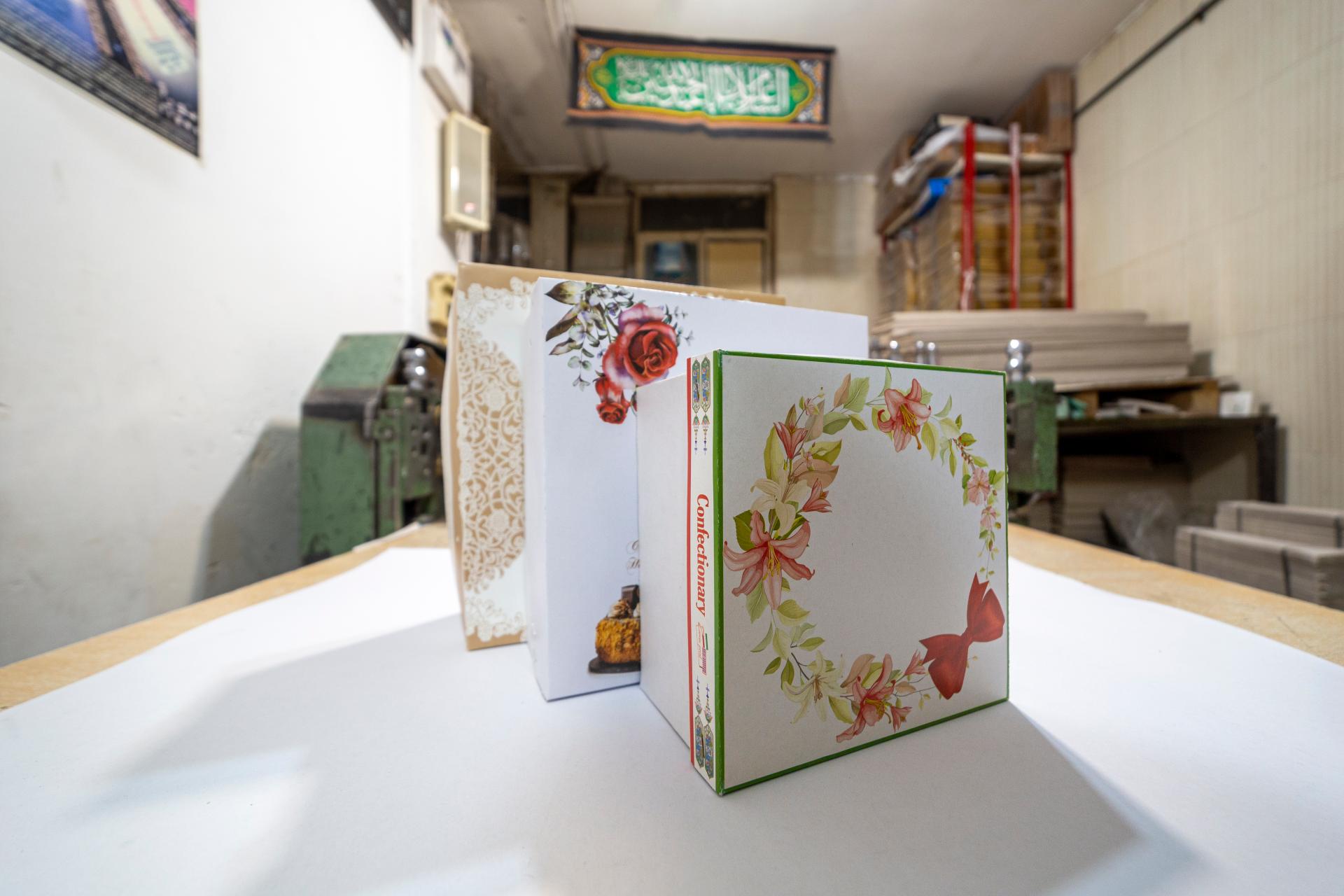 عکس چاپ و  جعبه سازی زرین