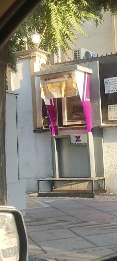 عکس عابر بانک اقتصاد نوین