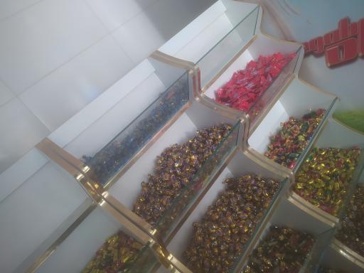 عکس سوپرمارکت دهکده