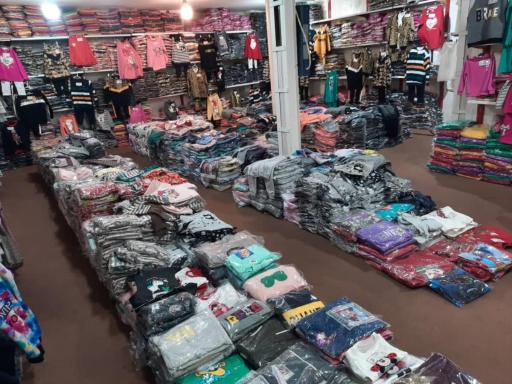 عکس تولید و پخش پوشاک بچگانه حق دوست