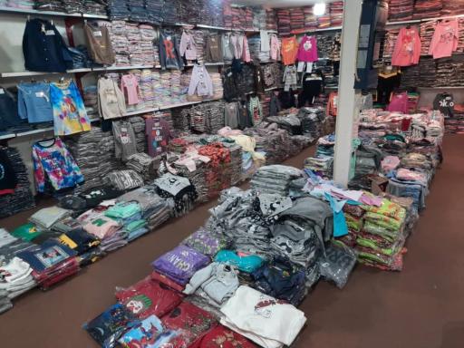 عکس تولید و پخش پوشاک بچگانه حق دوست