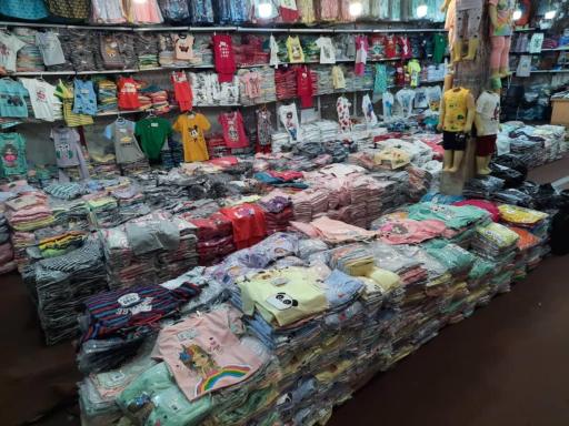 عکس تولید و پخش پوشاک بچگانه حق دوست