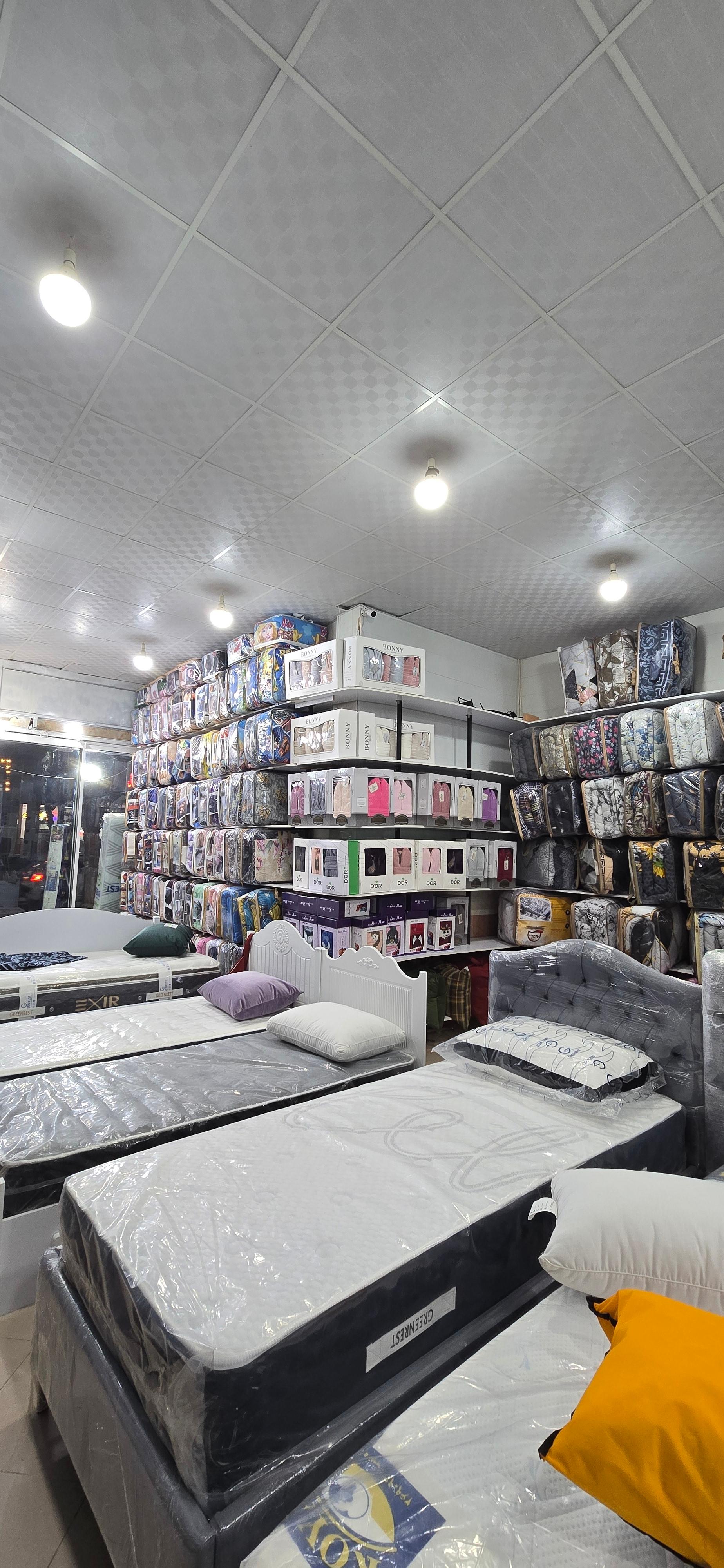 عکس فروشگاه بزرگ روتختی پتو کالای خواب