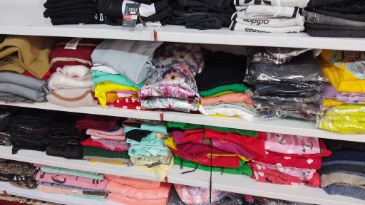 عکس فروشگاه پوشاک خانواده