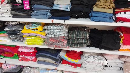 عکس فروشگاه پوشاک خانواده