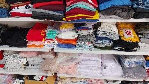 عکس فروشگاه پوشاک خانواده