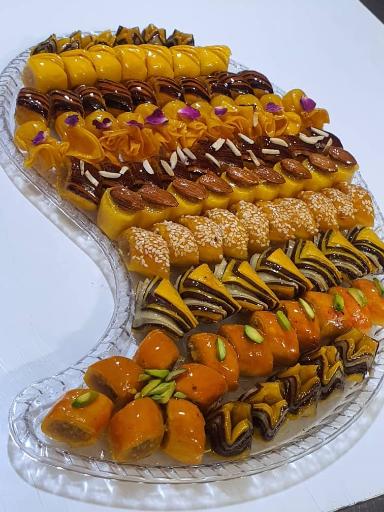 عکس شیرینی سرای خوشه ابادان